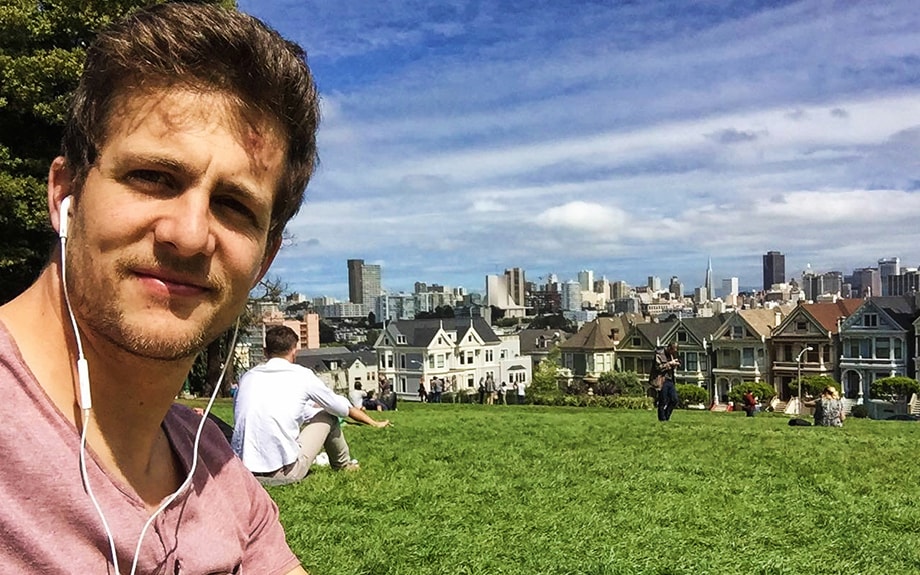 Picture of Thomas Michaeler sitting down in a park in California